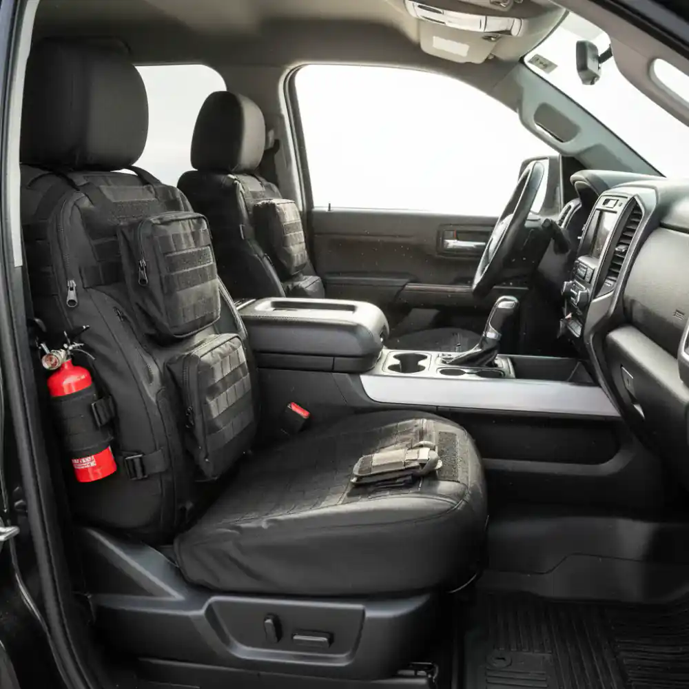 Tactical style all-weather seat covers installed in a truck